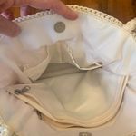 Lina Shoulder Bag Colorful Rainbow Stripe Crochet with Floral Pin Zipper Pull Red Photo 9