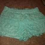 Love Culture Flowy Mint Ruffled Shorts Photo 0