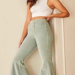 Free People We The NWT CRVY Ma Cherie cord flare pants size 33, 16β waist Photo 5