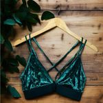 PINK - Victoria's Secret Victoria's Secret PINK Velvet Triangle Bralette in green. Photo 1