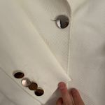 Carolina Herrera CH  white single-button blazer. Photo 5