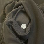 Lululemon  On the Fly 7/8 Pant *Woven - Black - Size 8 Photo 6