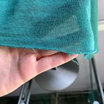 H.I.P. uneven hem flowy green top with round neck Photo 11