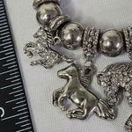 Silver Stretch Bracelet with CZ Horse Charms Photo 2