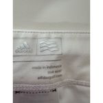 Adidas  skort size large white with gray stripe at bottom Photo 7