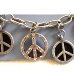 Icing NWT  Peace Silver Tone Link Chain 5"-7" Toggle Latch Unisex Bracelet Photo 1