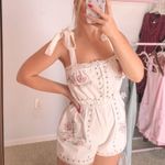 Champagne Sisters Collection Spring White Floral Romper Photo 0