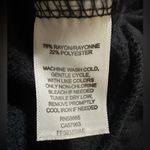 Free Press  flirty ruffle bottom hoodie black size Medium Photo 6