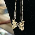 Silver costume 4 necklaces two sides of butterfly key and linked hearts preowned Photo 1