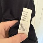 Free People NWOT  Xena Tank in Black High Neck Loose Arms Size Medium Photo 4