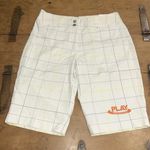 Nike Woman’s  Dri-Fit Golf Bermuda Shorts White w/blue & yellow stripes Size 6 Photo 0