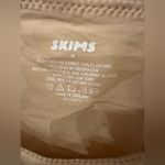 SKIMS  Fits Everybody High Neck Bodysuit, size Medium Color Mica Photo 1