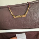 Chico's Chico’s Maroon faux leather jacket size 2 (their 12/14 or large) Photo 4