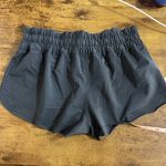 Lululemon black/ dark grey perforated shorts see photo for sizing Photo 7