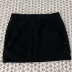 Under Armour UAS  Black Blue Athletic Sportswear Skirt By Tim Coppens Size 2 Photo 4