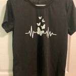 SheIn graphic tee Photo 0