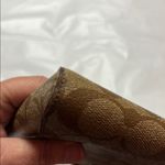 Coach  Brown Clutch with Monogram Pattern and Zipper Closure Photo 10