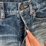 Saint Laurent YSL Mid Rise Cutoff Fray Denim Shorts Photo 1