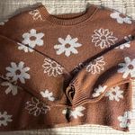 A Pink Flower Sweater Photo 0