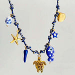 Handmade Boho Tassel Necklace – Stainless Steel Charms, Hypoallergenic & Water Resistant multiple charms Photo 0