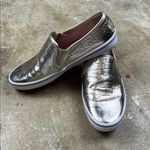 Kate Spade Gold metallic slip on sneaker
Size: 7 Photo 1