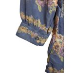 The Hanger  Floral Romper Size Medium Baby Blue Long Sleeve Pockets Floral Shorts Photo 5