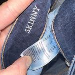 American Eagle distressed dark wash size 12 skinny jeans Photo 1