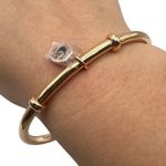 Coach NWOT  Charm Gold Tone Bracelet Photo 0