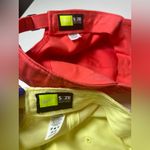 Nike  Women's Caps in Coral and Pale Yellow Photo 7