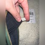 Coach NWT Signature Leather Corner Zip Wristlet. Photo 6