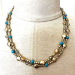 Vintage America gold tone and blue beaded necklace Photo 0