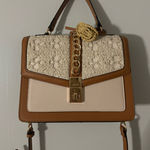 ALDO Boho  tan and beige purse Photo 0
