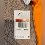 Nike  Dri-Fit Golf Tour Bright Ceramic Orange Button Down Polo Shirt Photo 6