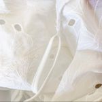 Nsr White Eyelet Peplum Top Photo 2