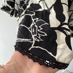 White House | Black Market  Black and White Floral 100% Silk Pleated Knee Skirt Photo 2
