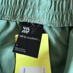 All In Motion  Women's Green Stretch Woven Taper Pants - Size Large - NWT Photo 1