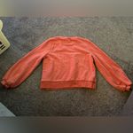 A New Day  Orange Sweatshirt Photo 1