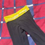 Sanrio Y2k  Hello Kitty black yellow fold over waist flare leg yoga pants grunge Photo 1