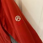 The North Face Prima Loft Summit Series Winter Coat in Red & Grey Photo 4