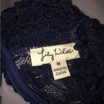 Lily White  lace shirt in navy with neck hugging color and 2 gold buttons Photo 4