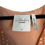 L'Academie L’academie Revolve Orange Geometric Print Flutter Sleeve Tie Front Blouse Photo 1