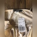 Forever 21  gold silky spandex body suit size Large NWT Photo 1