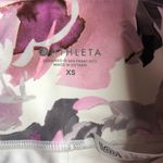 Athleta Stash Pocket Salutation Peony Tight Leggings Photo 3