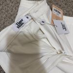 Tiger Mist  - White Pants Photo 1