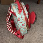 Lounge Fly 2022 Disney Parks Christmas Holiday Peppermint Candy Cane  Backpack Bag Photo 2