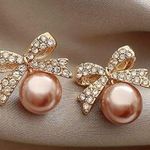 Delicate Bow With Imitation Pearl Design Stud Earrings Photo 0