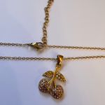 Pink cherry charm zirconia gold necklace Photo 1