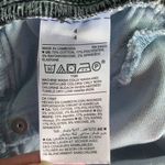 Old Navy Rockstar Mid-Rise Distressed Jeans Photo 10