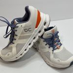 on cloud On Running Women's Athletic Shoes in White, Orange, and Blue Photo 0