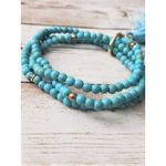 Vintage Bracelet / Bangle Stretchy Turquoise Tone with Tassel & Elephant Blue Photo 1